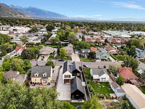 Aerial view of residential area with a mountainous background