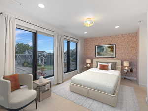 Bedroom featuring wallpapered walls, recessed lighting, access to exterior, and carpet flooring