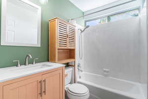 Full bathroom with bathtub / shower combination and vanity