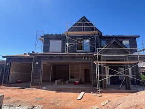 Back of property with a patio area