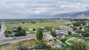Aerial view of residential area featuring a mountain backdrop