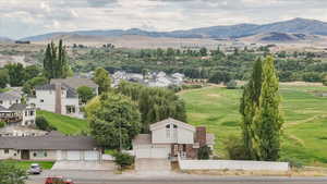 Aerial view of residential area with a mountainous background