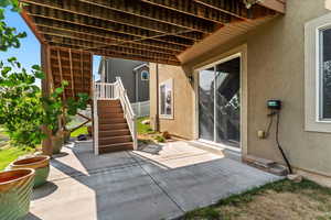View of patio featuring stairway