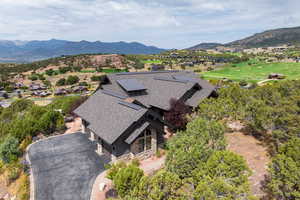 View of subject property with a mountain backdrop