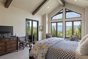 Bedroom featuring beamed ceiling, light carpet, high vaulted ceiling, recessed lighting, and access to outside