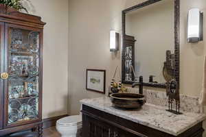 Bathroom with vanity and tile patterned flooring