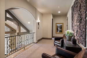 Sitting room featuring light carpet and recessed lighting