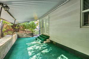 View of property exterior featuring entry steps