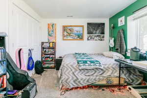 Bedroom featuring carpet flooring
