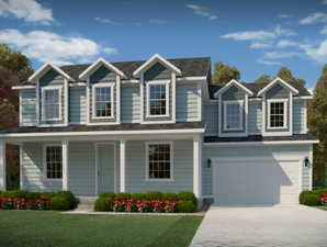 View of front of home featuring concrete driveway, covered porch, a garage, and a front yard
