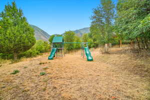 Community play area with a mountain view