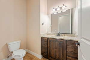 Bathroom featuring vanity and light tile patterned flooring