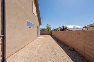 View of fenced backyard