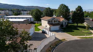 Aerial view of residential area featuring mountains