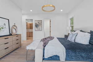 Bedroom featuring wood finished floors and recessed lighting