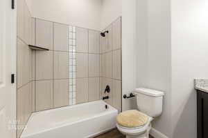 Full bathroom with vanity and shower / bathtub combination