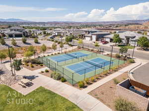 Aerial view of residential area with a mountainous background