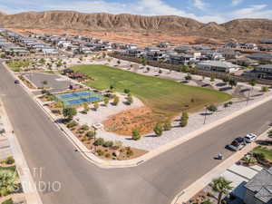 Aerial view of residential area featuring mountains