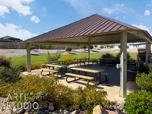 Surrounding community with a patio area and a yard