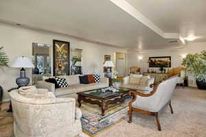 Formal Living room featuring carpet
