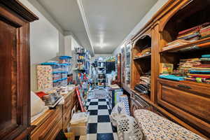 Walk in closet with large storage areas.