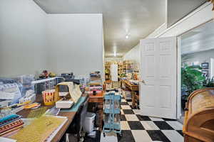 Laundry/craft  room featuring tile patterned floors