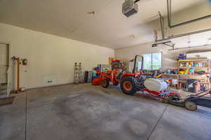 Garage featuring a garage door opener