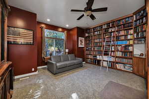 Bedroom or Library  featuring carpet floors, bookshelves, ceiling fan, and recessed lighting