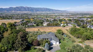 Aerial view of residential area with a mountain backdrop