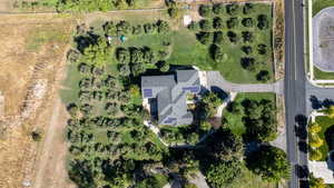 Aerial view of property and surrounding area with rural landscape