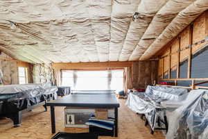 Game room featuring lofted ceiling