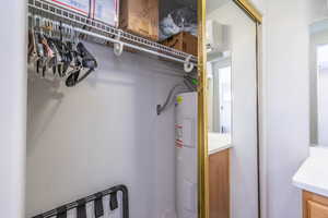 Casita Closet with water heater and an AC wall unit