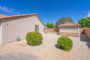 Large Yard and a partially fenced backyard, and a tile roof