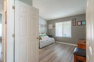 2nd Bedroom with LVP flooring and baseboards