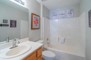 2nd Bathroom featuring bathing tub / shower combination and vanity