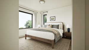Rendering - Bedroom featuring wood finished floors and baseboards