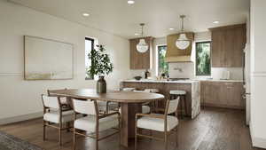 Rendering - Dining space featuring dark wood-style floors and recessed lighting