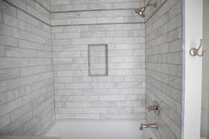 Bathroom featuring shower / bath combination