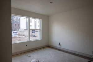 Spare room with baseboards