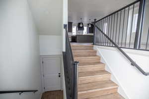 Stairway with wood finished floors