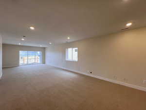 Basement bonus room featuring walk out access to backyard.