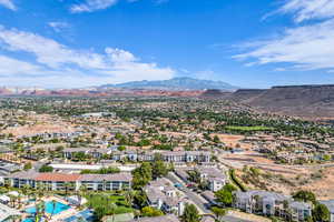 Aerial view of residential area featuring mountains