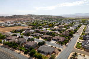 Aerial view of residential area featuring mountains