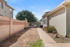 View of yard with a gate