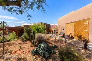 View of yard featuring a patio and a mountain view