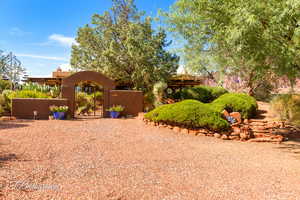 View of yard with a gate