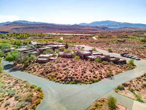 View of rural area featuring a mountain backdrop and nearby suburban area
