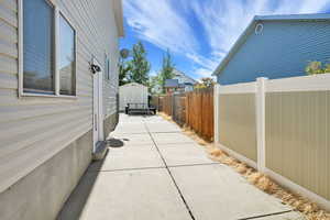 View of home's exterior featuring a shed