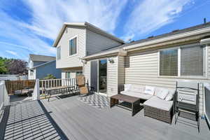 Deck with an outdoor living space