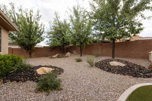 View of fenced backyard